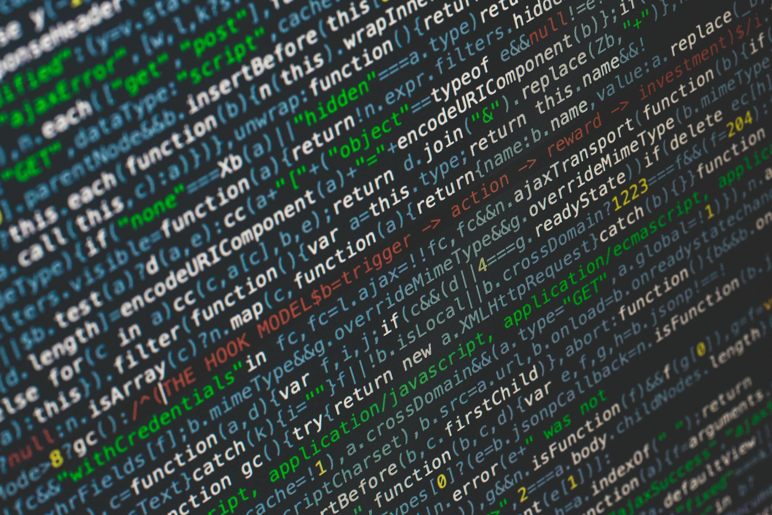 Close-up of colorful programming code displayed on a computer screen.